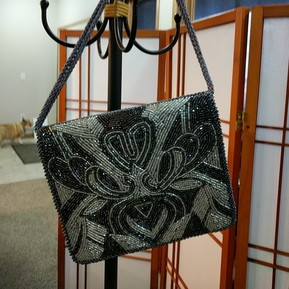 Silver satin beaded clutch